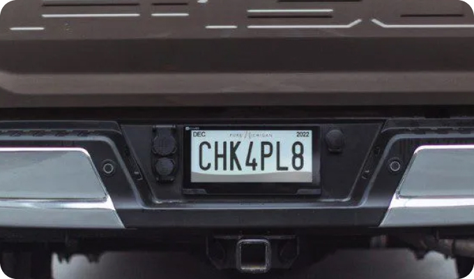 Digital license plate on vehicle